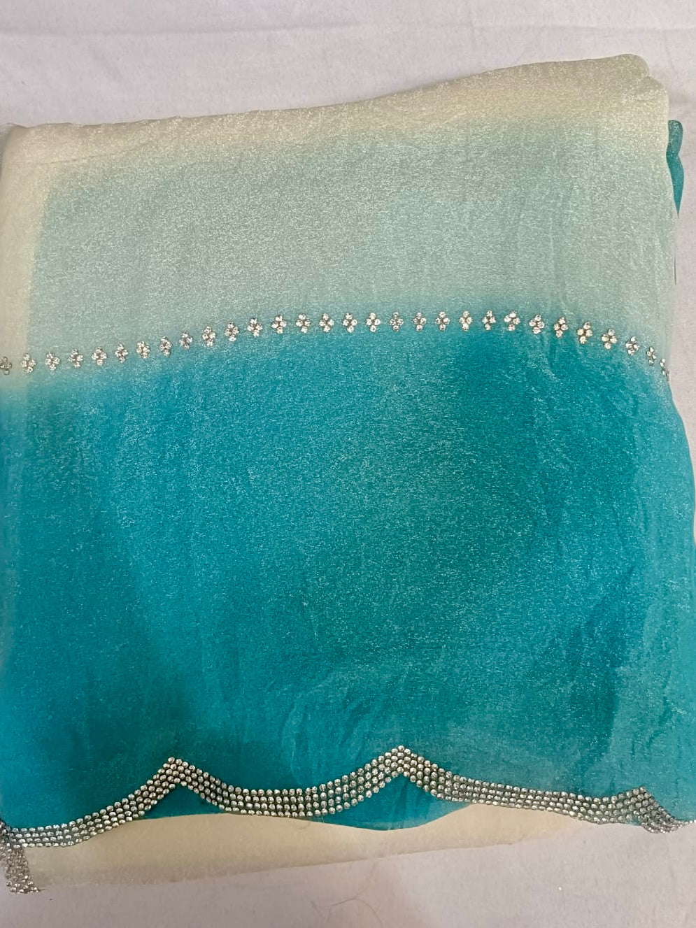 premium georgette shimmer siroski work border saree